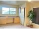 Bedroom with desk, storage, and a window with a view, providing a versatile living space at 8000 Badura Ave # 2009, Las Vegas, NV 89113