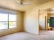 Sunlit living room featuring a large window and a view to the exterior at 8000 Badura Ave # 2009, Las Vegas, NV 89113