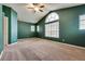 Spacious bedroom with carpet, recessed lights, and large arched window at 8253 Ruby Mountain Way, Las Vegas, NV 89128