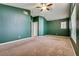 Large bedroom with carpeted floors and neutral decor at 8253 Ruby Mountain Way, Las Vegas, NV 89128