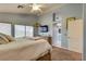 Bright main bedroom boasts natural light and adjoins the bathroom at 8253 Ruby Mountain Way, Las Vegas, NV 89128