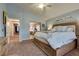 Spacious main bedroom with plush carpet leads to comfortable living area at 8253 Ruby Mountain Way, Las Vegas, NV 89128