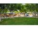 Scenic park view with a covered picnic area, playground equipment, and open green space at 8253 Ruby Mountain Way, Las Vegas, NV 89128