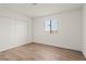 Bedroom featuring a window for natural light and a closet with sliding doors at 829 Rock Springs Dr # 201, Las Vegas, NV 89128