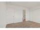 Bedroom showcases wood floors, closet, and an adjoining bathroom at 829 Rock Springs Dr # 201, Las Vegas, NV 89128