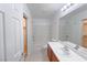 Bright bathroom featuring a shower-tub combination and cherry-wood cabinets at 9148 Alluring Ave, Las Vegas, NV 89149
