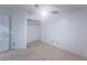 Neutral bedroom with carpet features a closet and a ceiling fan and light at 9148 Alluring Ave, Las Vegas, NV 89149