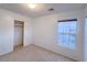 Bright bedroom with a window view and spacious closet at 9148 Alluring Ave, Las Vegas, NV 89149