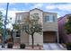 Attractive two-story home with a covered two car garage and inviting curb appeal at 9148 Alluring Ave, Las Vegas, NV 89149
