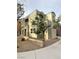 Charming two-story home featuring a balcony, well-kept landscaping, and a sidewalk at 9148 Alluring Ave, Las Vegas, NV 89149