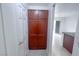 Hallway with a large pantry featuring abundant storage space and modern design at 9148 Alluring Ave, Las Vegas, NV 89149