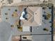 An aerial view of the property shows desert landscaping, a spacious lot and a well-maintained tile roof at 961 Laguna St, Pahrump, NV 89048