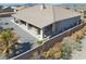 Aerial view of a private backyard with a covered patio, hot tub, and plenty of seating for relaxing or entertaining at 961 Laguna St, Pahrump, NV 89048