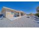 Spacious backyard with a covered patio area, perfect for outdoor gatherings and enjoying the serene environment at 961 Laguna St, Pahrump, NV 89048
