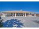 Large backyard featuring a covered patio and hot tub, perfect for outdoor entertainment and relaxation at 961 Laguna St, Pahrump, NV 89048