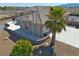 Beautiful property showcasing a well-maintained exterior and lush landscaping, creating a welcoming curb appeal at 961 Laguna St, Pahrump, NV 89048