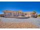 Charming home exterior with manicured landscaping, offering an inviting and picturesque curb appeal in a desirable location at 961 Laguna St, Pahrump, NV 89048