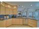 Well-appointed kitchen featuring granite countertops, stainless steel appliances, and ample cabinet space at 961 Laguna St, Pahrump, NV 89048