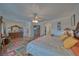 Cozy main bedroom with a large bed, dresser and access to the bathroom and closet at 961 Laguna St, Pahrump, NV 89048