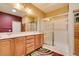 A spacious bathroom with double sinks, glass enclosed shower, and a luxurious sauna for relaxation at , Henderson, NV 89044
