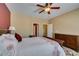 Cozy bedroom featuring a ceiling fan, ensuite bathroom, and ample closet space for convenient living at , Henderson, NV 89044