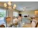 Open dining and living room space, featuring tile flooring and ample natural light at , Henderson, NV 89044