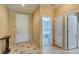 Hallway view with access to multiple rooms, featuring a tiled floor and neutral color scheme at , Henderson, NV 89044