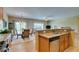 Open kitchen with granite counters, a breakfast bar, stainless steel appliances, and adjacent dining area at , Henderson, NV 89044