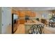 Bright kitchen with stainless appliances, granite countertops, a breakfast bar and dining nook at , Henderson, NV 89044