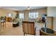 Comfortable living room with tile floors, neutral colors, and a view of the dining area at , Henderson, NV 89044
