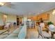 Bright open-concept living room and kitchen featuring tile floors and eat-in bar at , Henderson, NV 89044