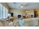 Open living area with tile floors, a fireplace, and stylish furniture, adjacent to the dining room at , Henderson, NV 89044