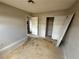 Bedroom showcasing a closet and repair needs, offering an opportunity for customization and renovation at 1004 Stone River Dr, North Las Vegas, NV 89030