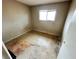 Bedroom needing renovations with neutral walls and natural light from window at 1004 Stone River Dr, North Las Vegas, NV 89030