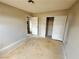 Bedroom features closet and door to bathroom; needs TLC and improvements at 1004 Stone River Dr, North Las Vegas, NV 89030