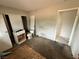 Bedroom exhibiting damage with closet and potential for renovation, ready for restoration at 1004 Stone River Dr, North Las Vegas, NV 89030