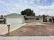 Charming single-story home with an attached garage and low-maintenance landscaping at 1004 Stone River Dr, North Las Vegas, NV 89030
