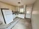 Functional kitchen featuring standard appliances and ample cabinet space at 1004 Stone River Dr, North Las Vegas, NV 89030
