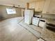 Open kitchen layout with ample countertop space, standard appliances, and easy access to the living area at 1004 Stone River Dr, North Las Vegas, NV 89030