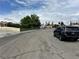 Street view showcases well-maintained homes, mature trees, and a pleasant neighborhood at 1004 Stone River Dr, North Las Vegas, NV 89030