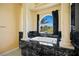 Bright bathroom showcasing a black marble soaking tub by the window at 1008 Trophy Hills Dr, Las Vegas, NV 89134