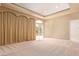 Spacious bedroom features neutral colors, carpet and direct access to a balcony at 1008 Trophy Hills Dr, Las Vegas, NV 89134