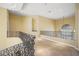 Upstairs hallway with elegant iron railing overlooking the entryway at 1008 Trophy Hills Dr, Las Vegas, NV 89134
