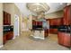 Spacious kitchen featuring stainless steel appliances and a large island cooktop at 1008 Trophy Hills Dr, Las Vegas, NV 89134