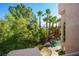 Backyard featuring a swimming pool and lush landscaping, ideal for relaxation at 1008 Trophy Hills Dr, Las Vegas, NV 89134