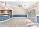 Open dining area features neutral tones and sliding glass doors to the backyard at 10113 Walhalla Plateau Ct, Las Vegas, NV 89148