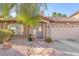 Charming single-story home with a stone pathway and manicured landscaping at 10113 Walhalla Plateau Ct, Las Vegas, NV 89148