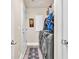 Laundry room with a modern washer and dryer set and plenty of storage space at 10113 Walhalla Plateau Ct, Las Vegas, NV 89148