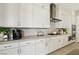 White kitchen features modern appliances, sleek countertops, and ample storage at 10196 Sequoia Glen Ave, Las Vegas, NV 89166