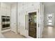 Kitchen displays modern appliances, custom cabinetry, and a glass-front refrigerator at 10196 Sequoia Glen Ave, Las Vegas, NV 89166